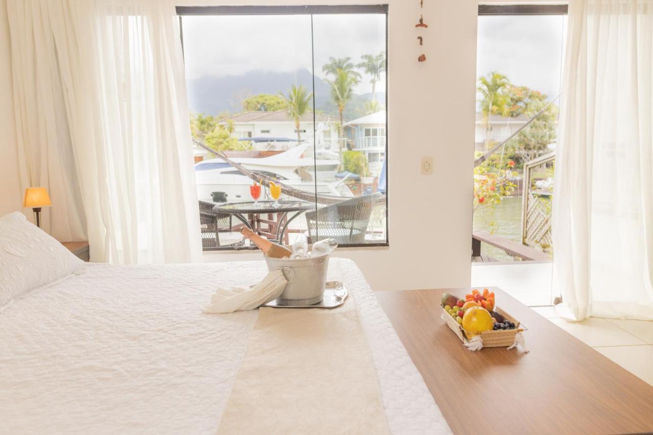 Suite met Kingsize Bed en Uitzicht op Zee